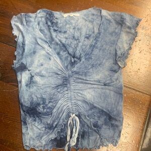 Blue v neck crop top with conch front